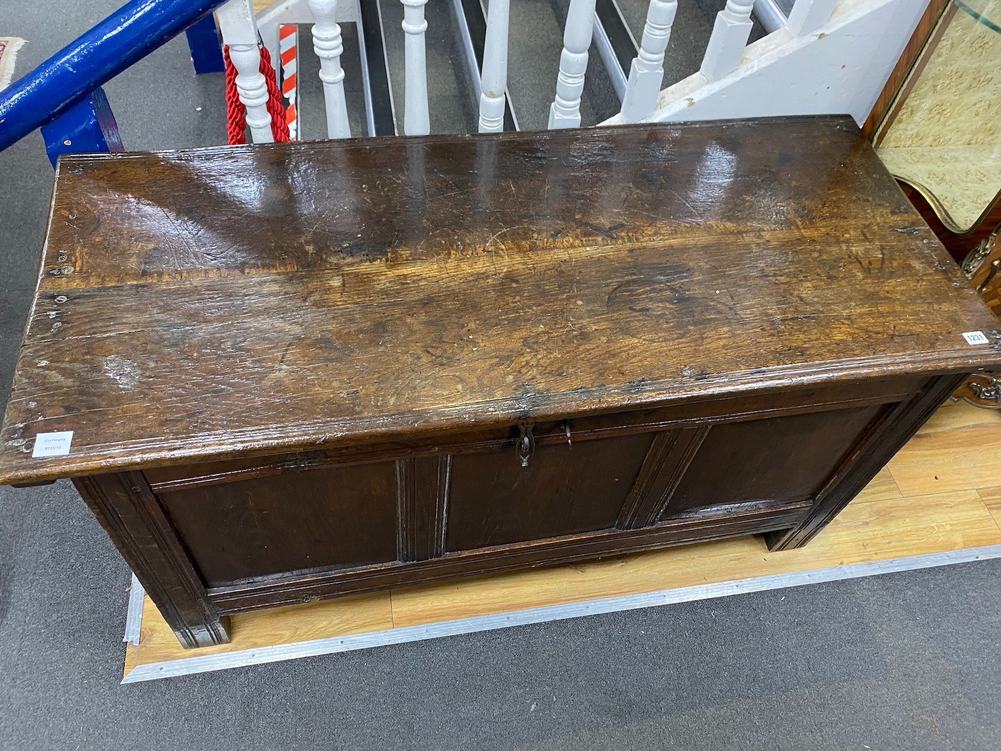 An 18th century oak coffer, width 140cm, depth 60cm, height 70cm